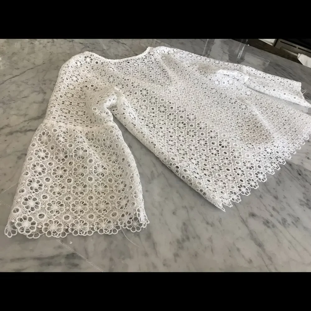 Lucy Paris eyelet top NWOT